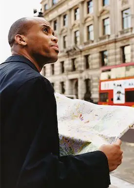 Man-holding-a-newspaper